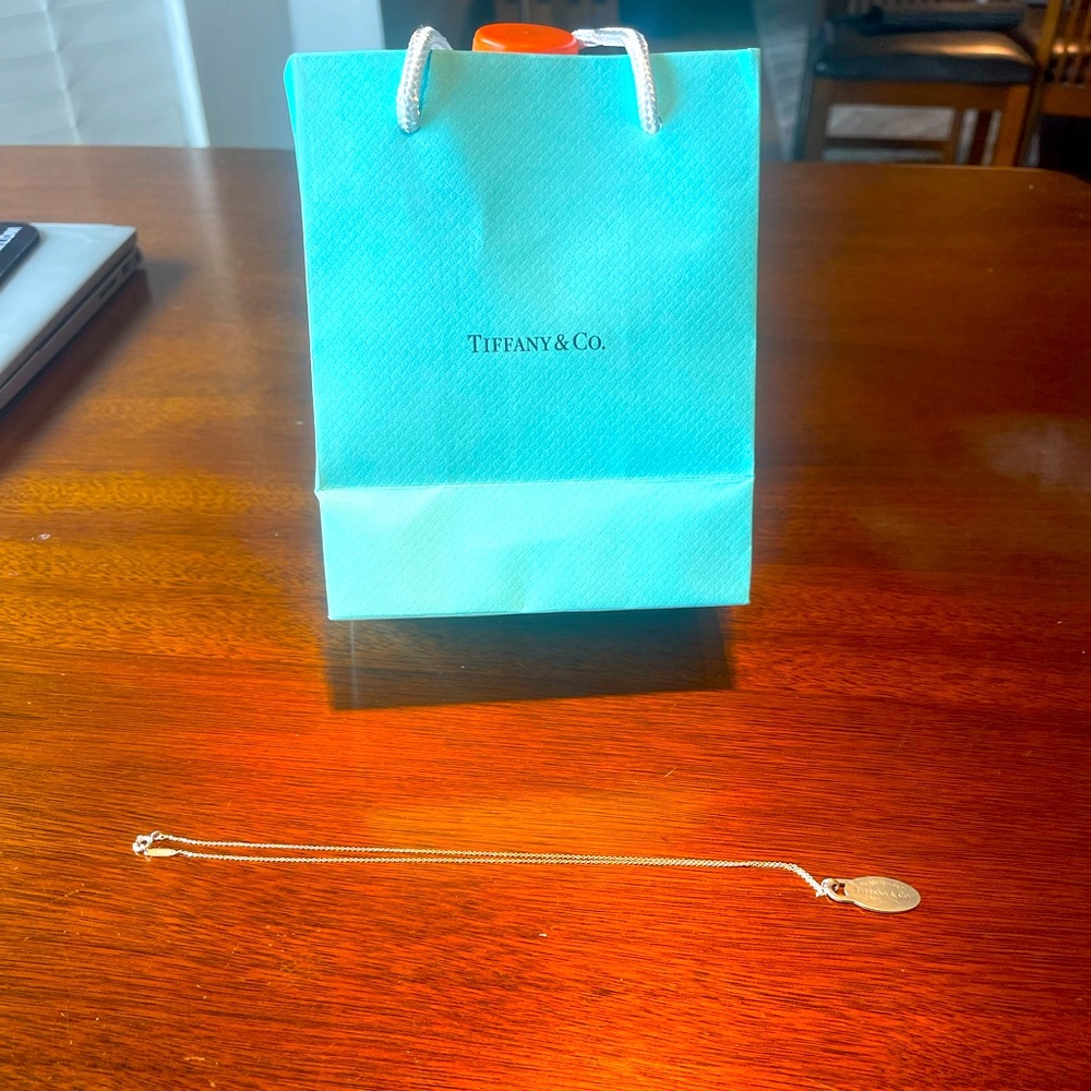 Tiffany & Co “Retirn to Tiffany “ pendant and chain